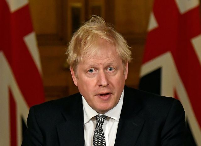Britain's Prime Minister Boris Johnson speaks during a press conference in 10 Downing Street, London, where he announced new restrictions to help combat a coronavirus surge.